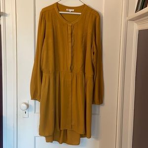 Yellow long sleeve button up drop-waist dress